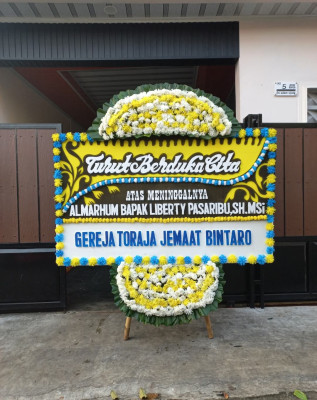 Papan Bunga Duka di Poncosari